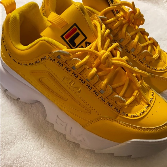all yellow fila shoes